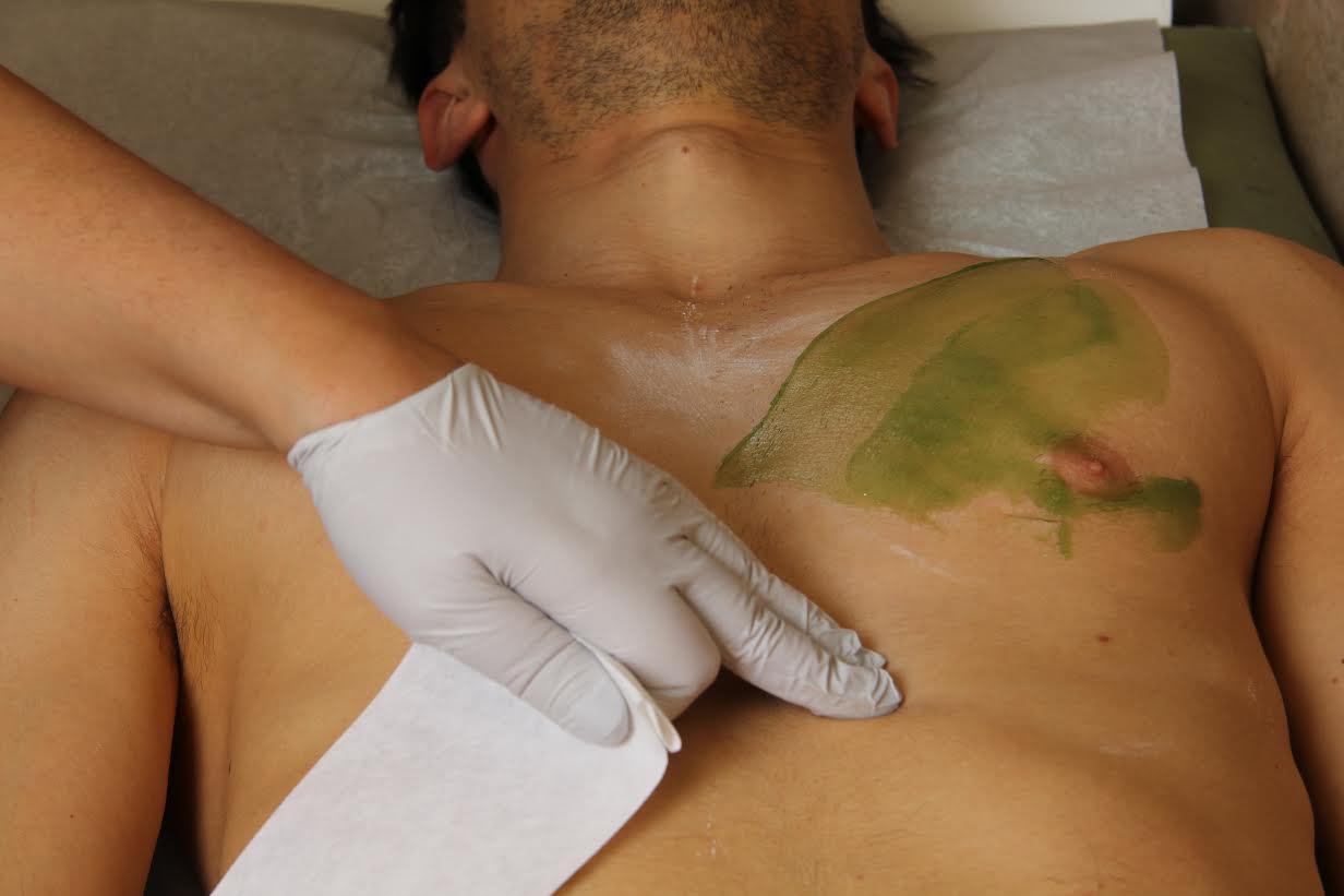 Expert wax strip removal for men at Male Brazilian Waxing NYC